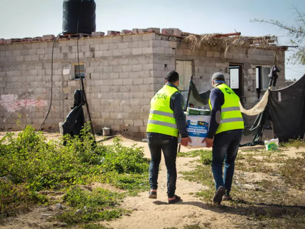 Elderly individual expressing gratitude for the donation